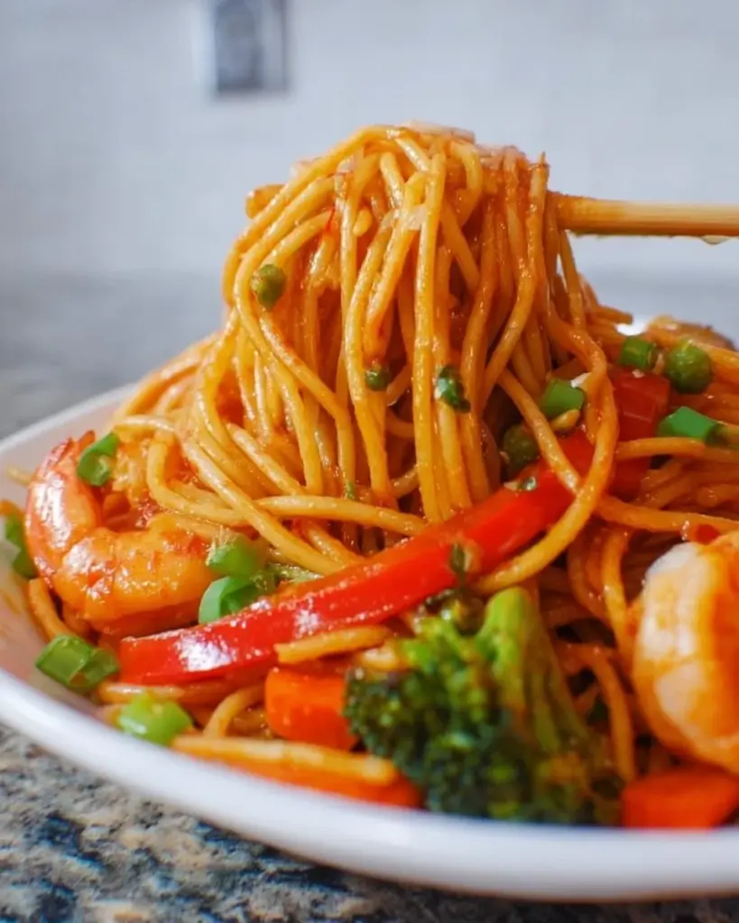 Delicious Shrimp Lo Mein featuring noodles, shrimp, and colorful veggies.