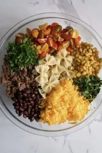 Delicious Cowboy Caviar Pasta Salad with vibrant vegetables and dressing